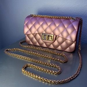 smooth textured rose gold mini purse